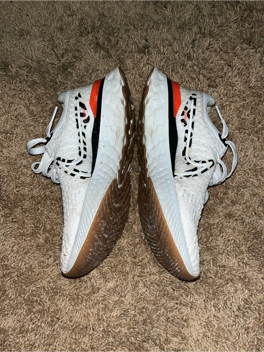 Nike White Knit Athletic Shoes with Gum Outsole and Orange Heel Accent